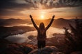 The girl raised her hands to the sun against the backdrop of the mountains. Healthy lifestyle, travel concept