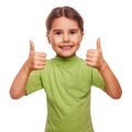 Girl raised her thumbs up smiling symbol indicates Royalty Free Stock Photo