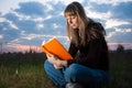 Girl reading the book