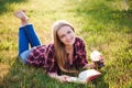 Girl reading a book in park, woman, green Royalty Free Stock Photo