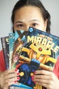 Girl reading comic books