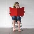 Girl reading an exciting book