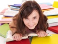 Girl reading pile colored book.