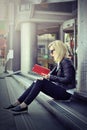 Girl reading red book Royalty Free Stock Photo