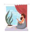 The girl reads a book on the windowsill. Window with a flower.