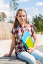 Girl Ready For School With Backpack and Books.