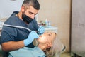 A girl at the reception dentist in a dental chair