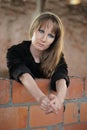 Girl recline on wall