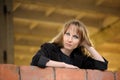 Girl recline on wall