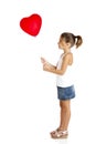 Girl with a red balloon Royalty Free Stock Photo