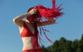 Girl in a red bathing suit on the beach Royalty Free Stock Photo