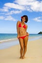 Girl in a red bikini on a Hawaii beach