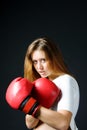Girl with red boxing gloves Royalty Free Stock Photo