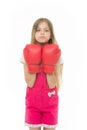 Girl in red boxing gloves isolated on white. Little child smile and boxing. Ready to fight. Adorable boxer. Power and Royalty Free Stock Photo