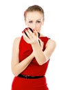 The girl in the red dress, imposes a make-up Royalty Free Stock Photo