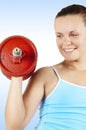 Girl and red dumbbell Royalty Free Stock Photo