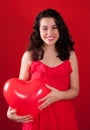 Girl and Red Heart Shaped Balloon Royalty Free Stock Photo