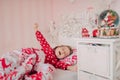 Girl in red pajamas sleeping in bed Royalty Free Stock Photo