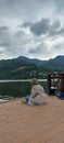 A girl reflecting her life in a lake