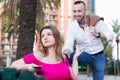 Girl is rejecting stranger man who wants acquintance with her Royalty Free Stock Photo