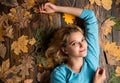 girl relax on autumn background. Beauty in autumn style. Sharing love to nature. Staying beautiful any season. autumn Royalty Free Stock Photo