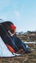 Girl relax in campsite, tourist in camp tent  trip on mountain nature, hiker woman enjoys valley Royalty Free Stock Photo