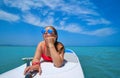 Girl relaxed lying on paddle surf board SUP