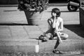 Girl relaxing in the city on a hot summer day. photo in black &