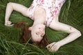 Girl is relaxing on the grass