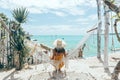 Girl relaxing in hammock in tropical beach cafe Royalty Free Stock Photo