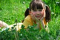 Girl relaxing in meadow Royalty Free Stock Photo