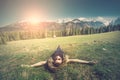 Girl relaxing in mountains view at mountains. Sunny spring landscape. Royalty Free Stock Photo