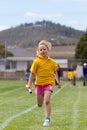 Girl in relay race Royalty Free Stock Photo