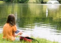 Girl with remote controlled boat Royalty Free Stock Photo