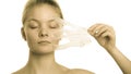 Girl removing facial peel off mask Royalty Free Stock Photo