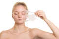 Girl removing facial peel off mask Royalty Free Stock Photo