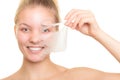 Girl removing facial peel off mask Royalty Free Stock Photo