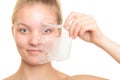 Girl removing facial peel off mask Royalty Free Stock Photo