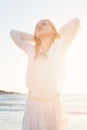 Girl Resting on the Beach in the Sunlight Royalty Free Stock Photo