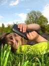 The girl is resting on the lawn Royalty Free Stock Photo