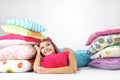 Girl resting on pillows