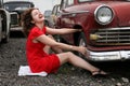 Girl beside retro car Royalty Free Stock Photo