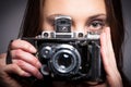 Girl with retro photo camera