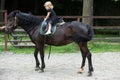 Girl ride on horse on summer day Royalty Free Stock Photo