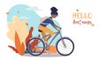 Girl rides a bike, African-American woman rides a bike in the autumn landscape. Poster or banner for bike shop, sportswear or