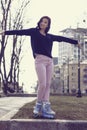 Girl rides on roller skates. Royalty Free Stock Photo