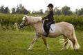 Girl rides to Horse Royalty Free Stock Photo