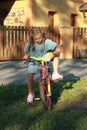 Girl riding the bicycle