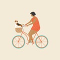 Girl riding a bicycle carrying basket with two cute chihuahua puppy in.