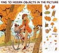 Girl riding a bike in autumn park. Find 10 hidden objects in the picture Royalty Free Stock Photo